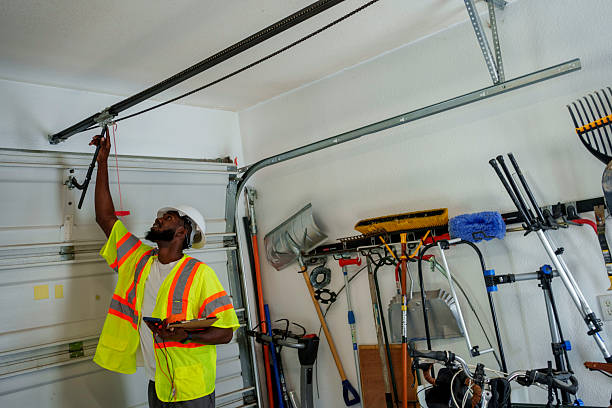 Professional Garage Door Roller Replacement technician working in Rutherford County County, NC